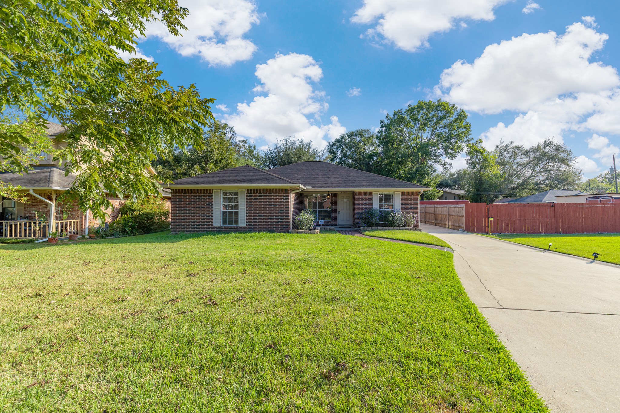 8018 Holiday Lane Houston, TX 77075 - Photo 2 of 42 a front view of house with yard and green space