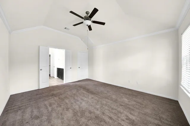 a bathroom with a double vanity sink and mirror