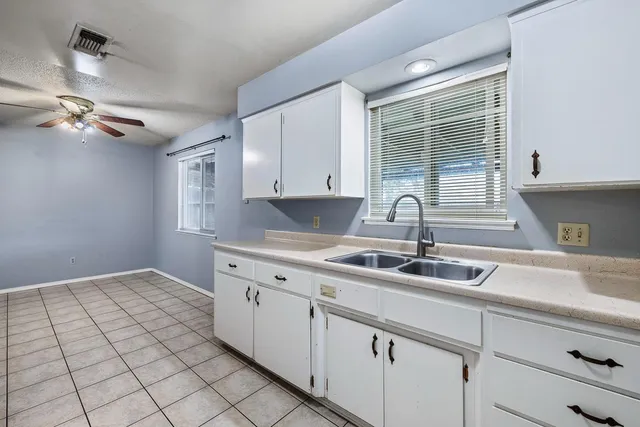 an empty room with a workbench