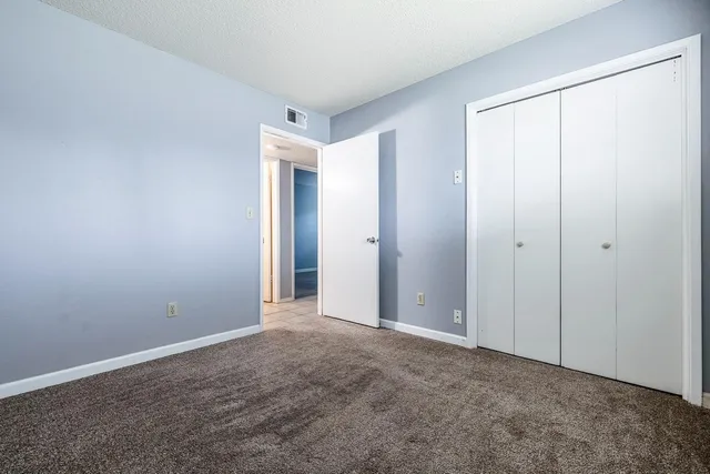 a bathroom with a sink toilet tub and shower