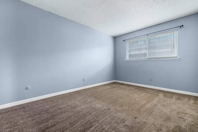 an empty room with a workbench