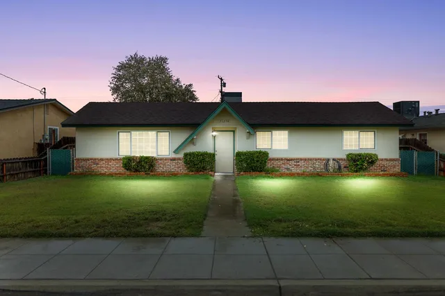 a view of front door with wooden floor