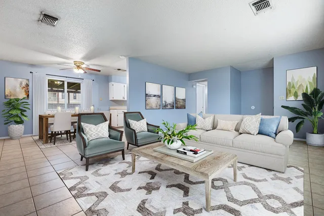 a kitchen with a sink cabinets and window