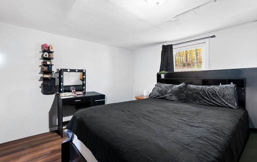 74 Princeton Street Gardner, MA 01440 - Photo 14 of 26 a bedroom with a bed and cabinets