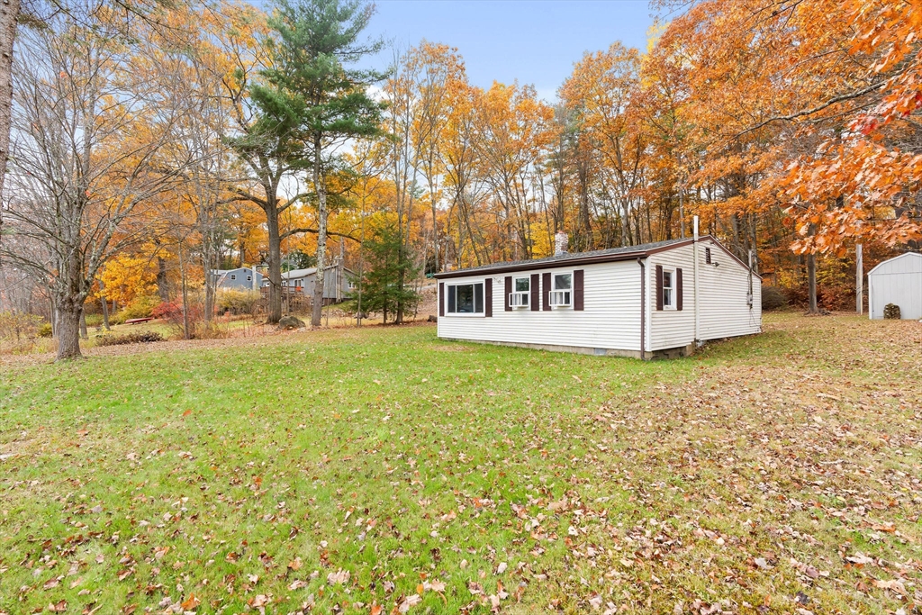 74 Princeton Street Gardner, MA 01440 - Photo 23 of 26 a view of a house with garden and trees