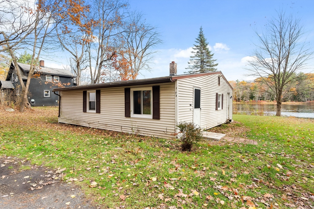 74 Princeton Street Gardner, MA 01440 - Photo 26 of 26 a front view of a house with garden