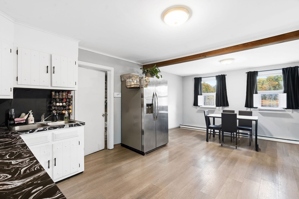 74 Princeton Street Gardner, MA 01440 - Photo 10 of 26 a kitchen with a sink appliances and cabinets