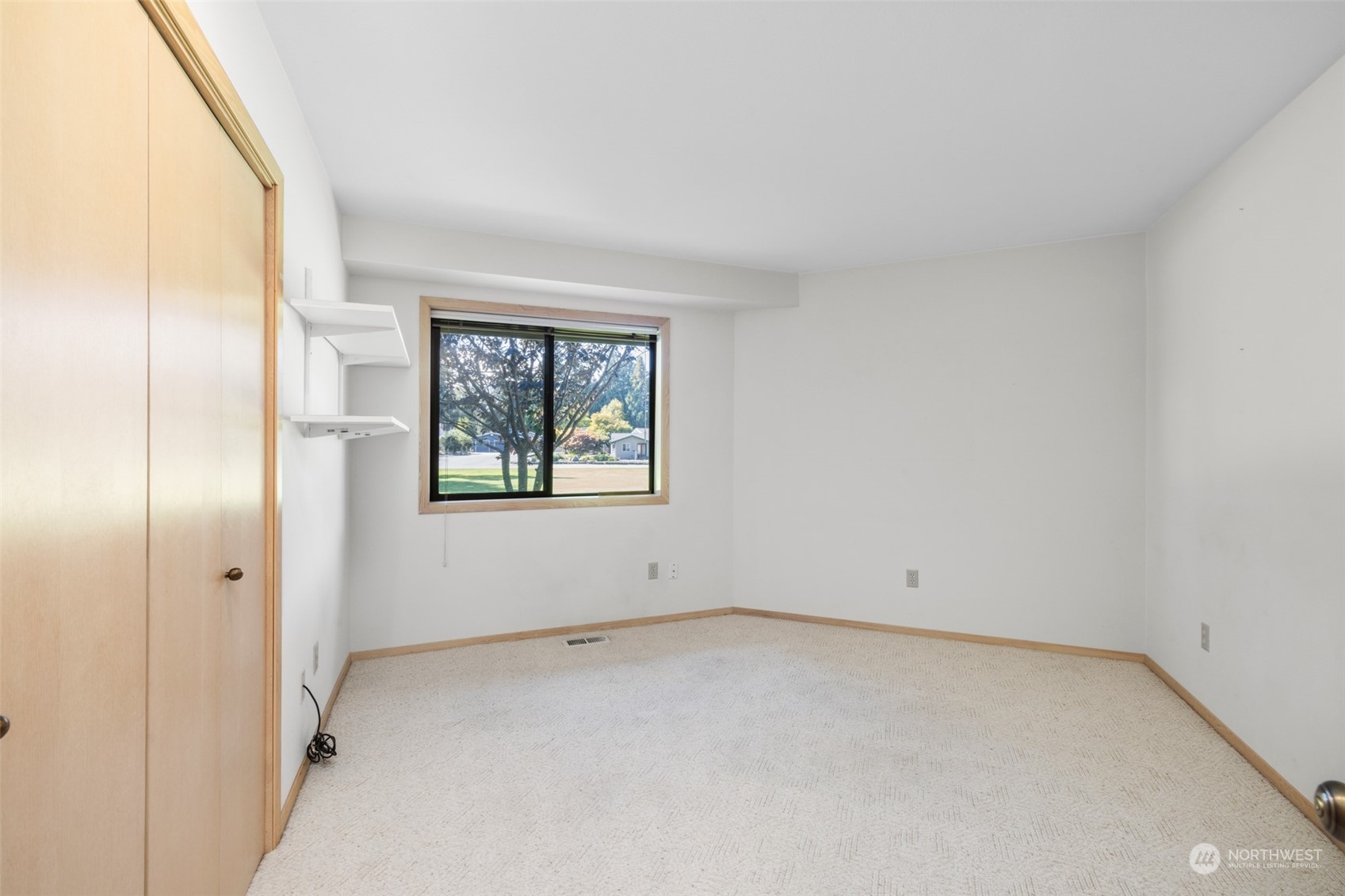 117 Williams Place Sequim, WA 98382 - Photo 17 of 40 an empty room with windows and closet