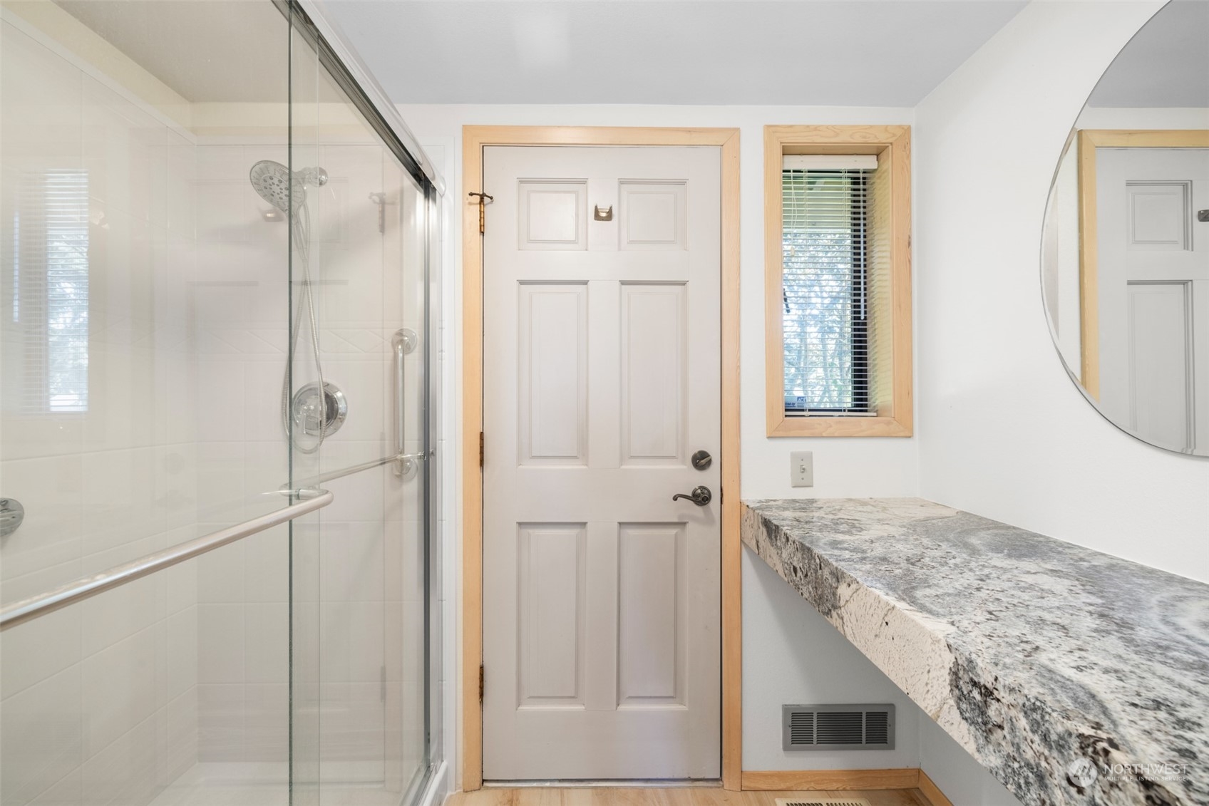 117 Williams Place Sequim, WA 98382 - Photo 19 of 40 a bathroom with a granite countertop sink and a mirror