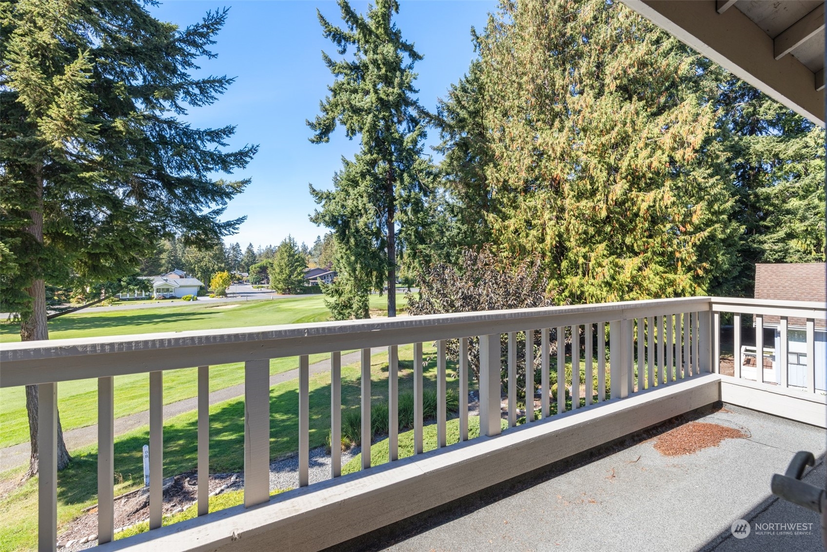 117 Williams Place Sequim, WA 98382 - Photo 25 of 40 a view of a wooden deck next to a yard