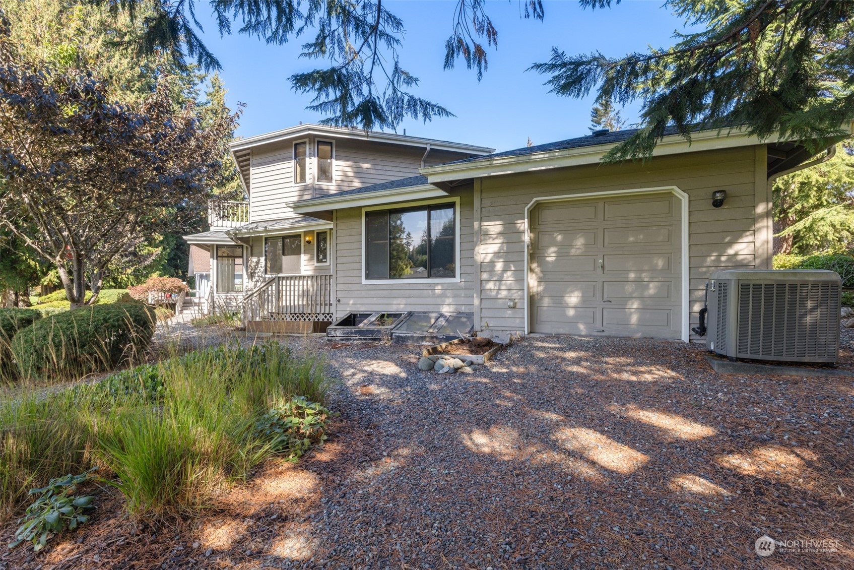 117 Williams Place Sequim, WA 98382 - Photo 32 of 40 a front view of a house with a yard