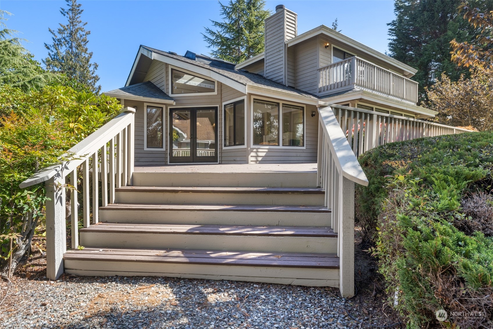 117 Williams Place Sequim, WA 98382 - Photo 34 of 40 a front view of a house with a small garden
