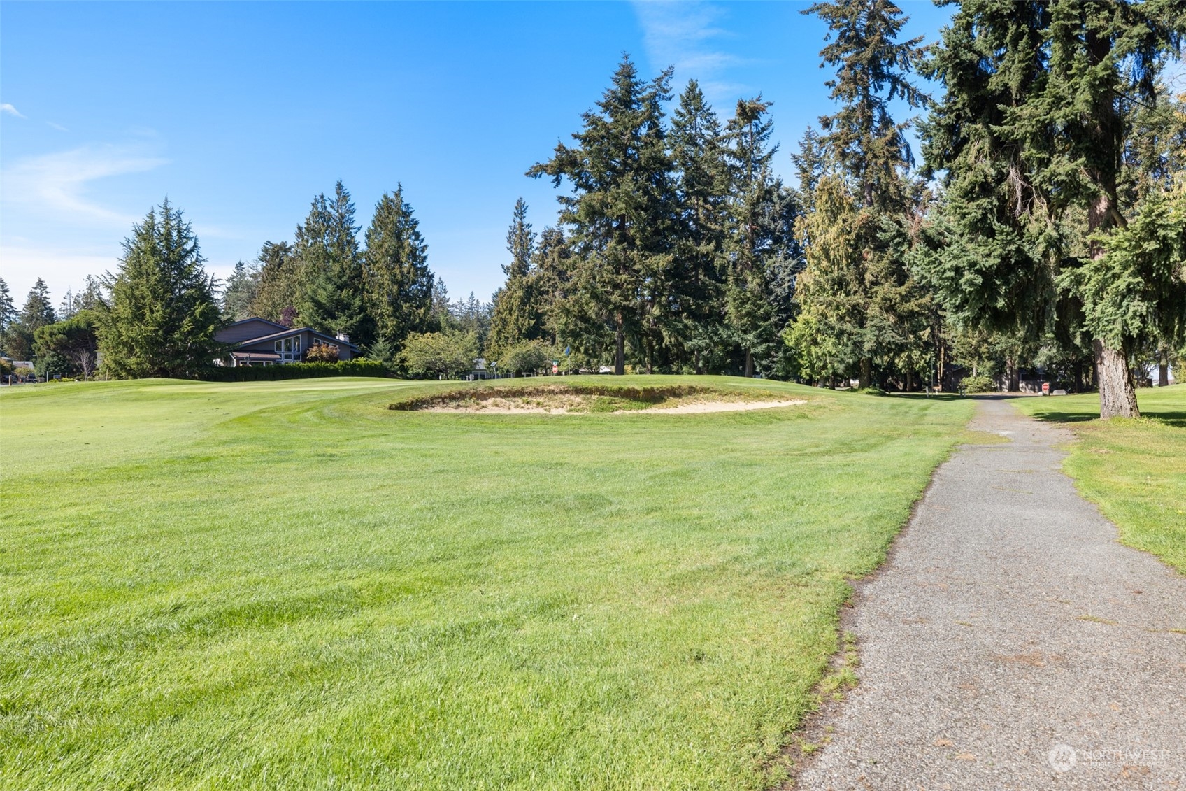 117 Williams Place Sequim, WA 98382 - Photo 36 of 40 a view of a swimming pool with a yard