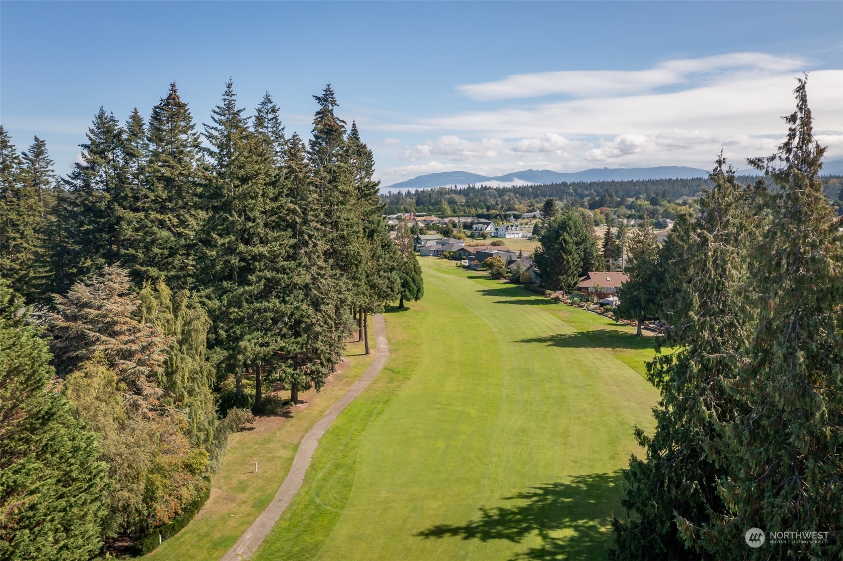 117 Williams Place Sequim, WA 98382 - Photo 40 of 40 a view of a lake with a city