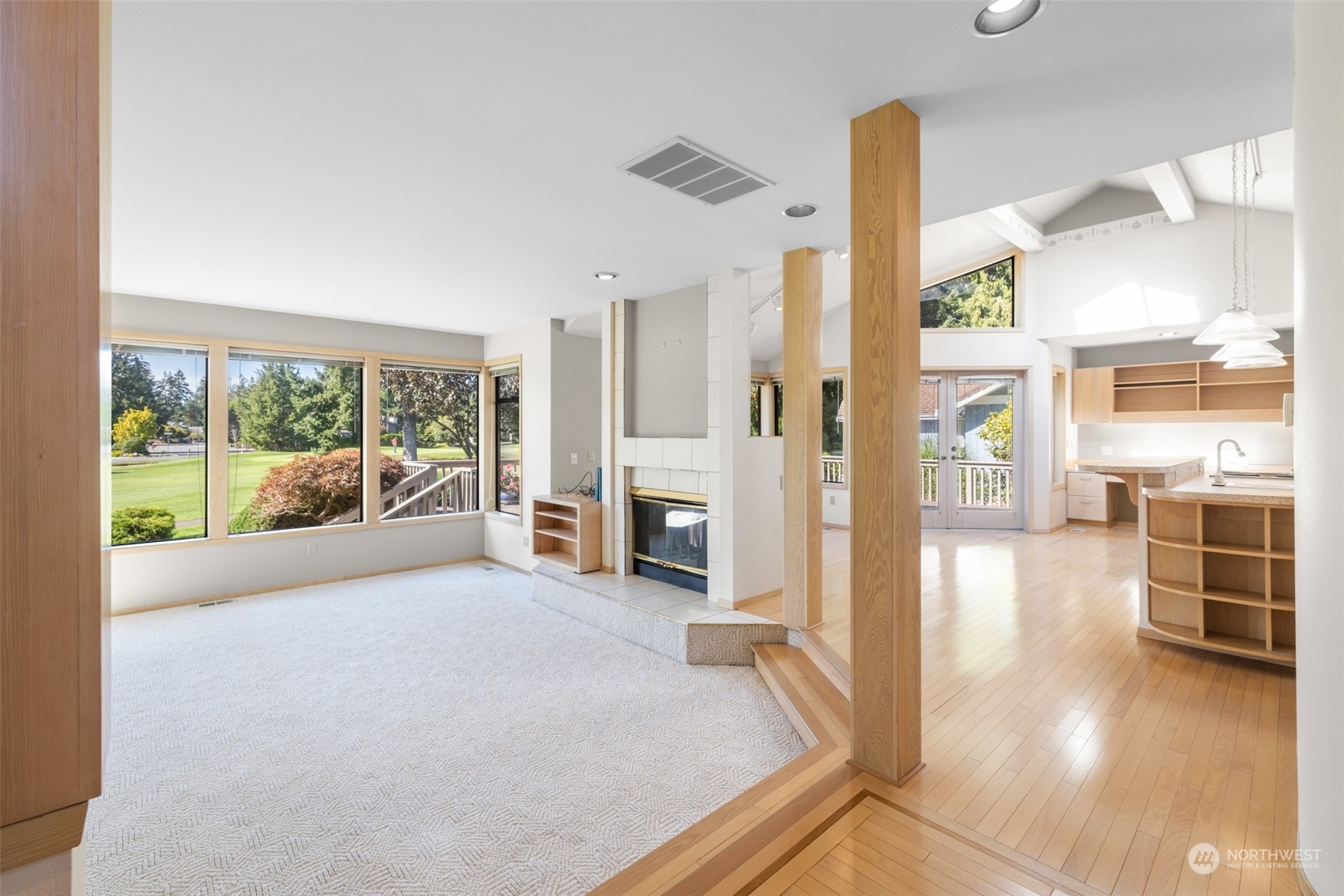 117 Williams Place Sequim, WA 98382 - Photo 6 of 40 a view of a hallway with furniture and a fireplace