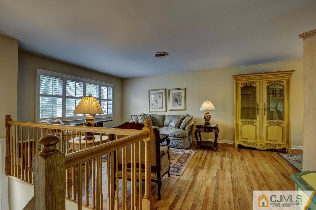 830 Inman Avenue Edison, NJ 08820 - Photo 4 of 21 a living room with furniture and a window