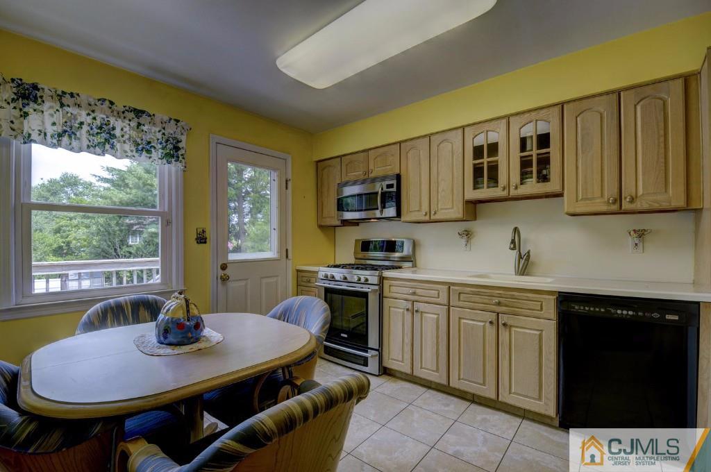 830 Inman Avenue Edison, NJ 08820 - Photo 8 of 21 a view of a dining room with furniture window and outside view