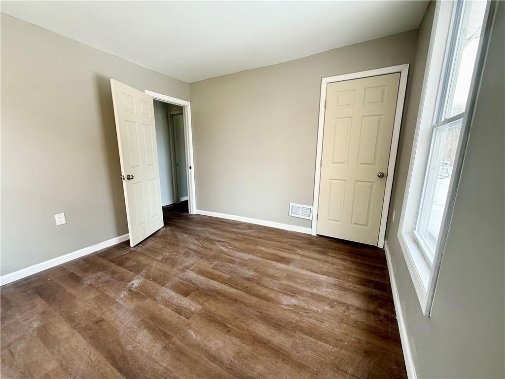 841 2nd Avenue Beaver Falls, PA 15010 - Photo 17 of 23 an empty room with wooden door