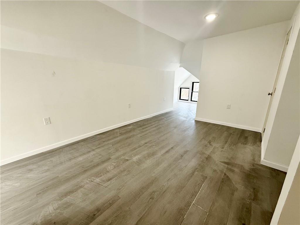 841 2nd Avenue Beaver Falls, PA 15010 - Photo 20 of 23 an empty room with wooden floor and a window