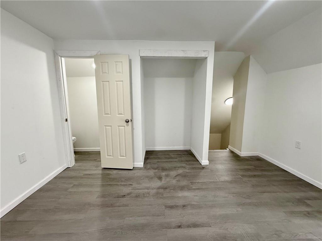 841 2nd Avenue Beaver Falls, PA 15010 - Photo 21 of 23 an empty room with wooden door