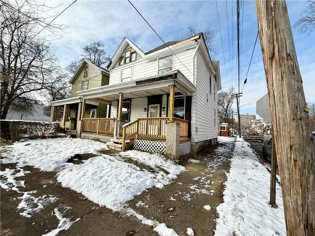 841 2nd Avenue Beaver Falls, PA 15010 - Photo 23 of 23 a front view of a house with a yard