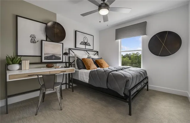 a bed room with a bed and a chandelier