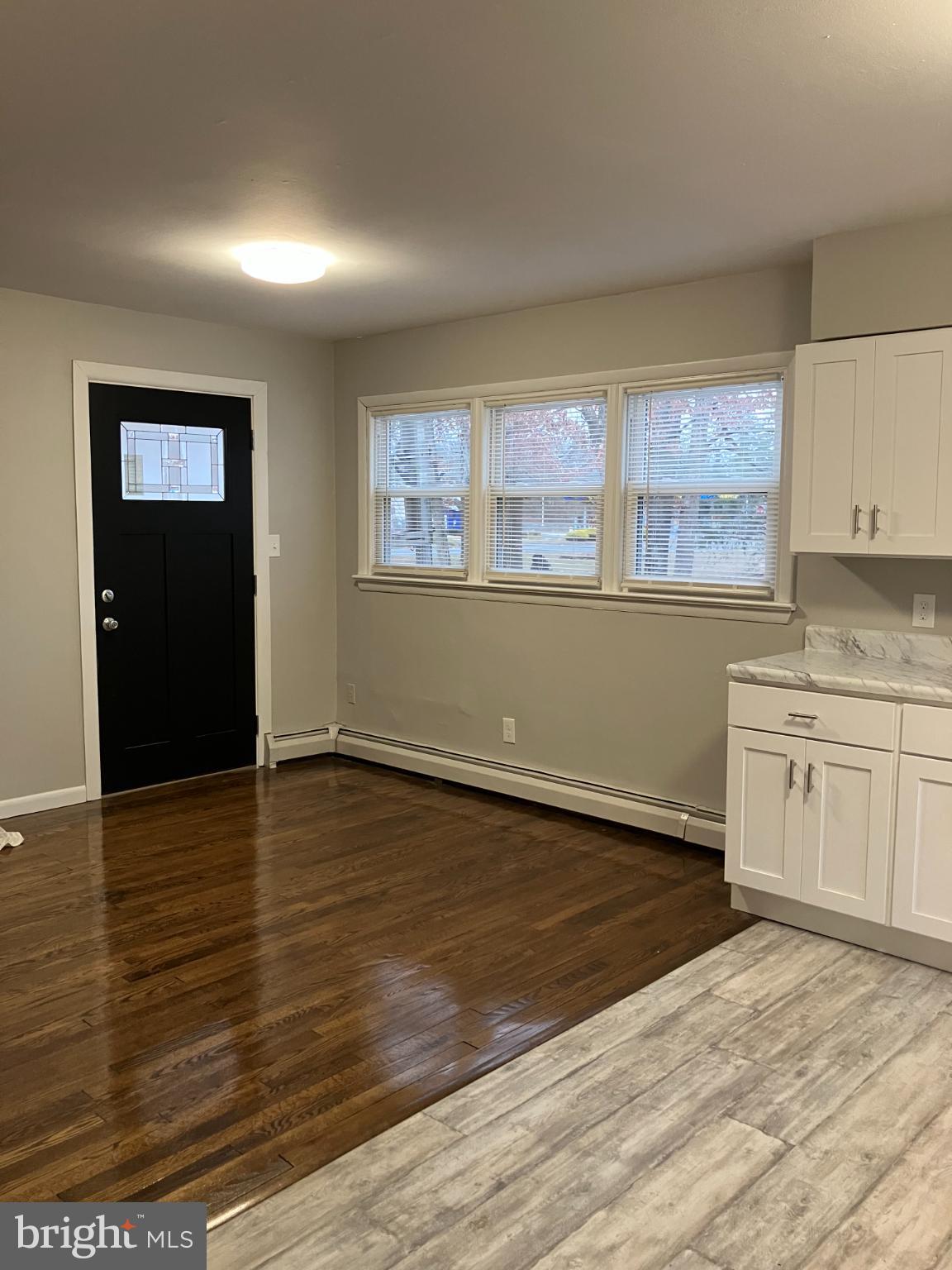 1533 Highway 206 Tabernacle, NJ 08088 - Photo 6 of 14 a view of a kitchen with wooden floor and electronic appliances