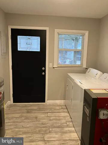 a room with a sink and a window