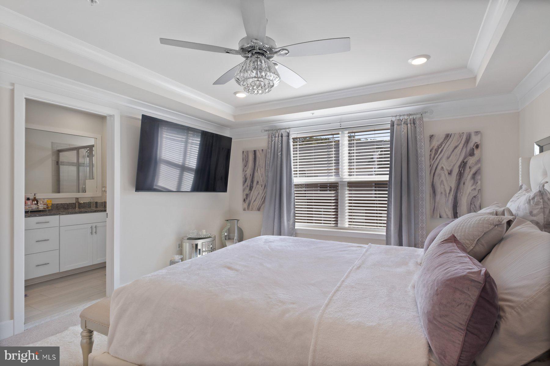 6960 Farragut Drive Bryans Road, MD 20616 - Photo 16 of 25 a bedroom with a large bed and a tv