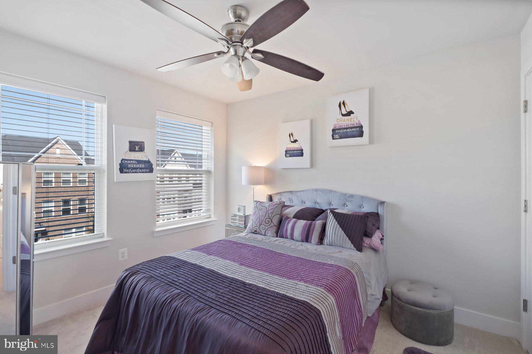 6960 Farragut Drive Bryans Road, MD 20616 - Photo 22 of 25 a bedroom with a large bed and a window