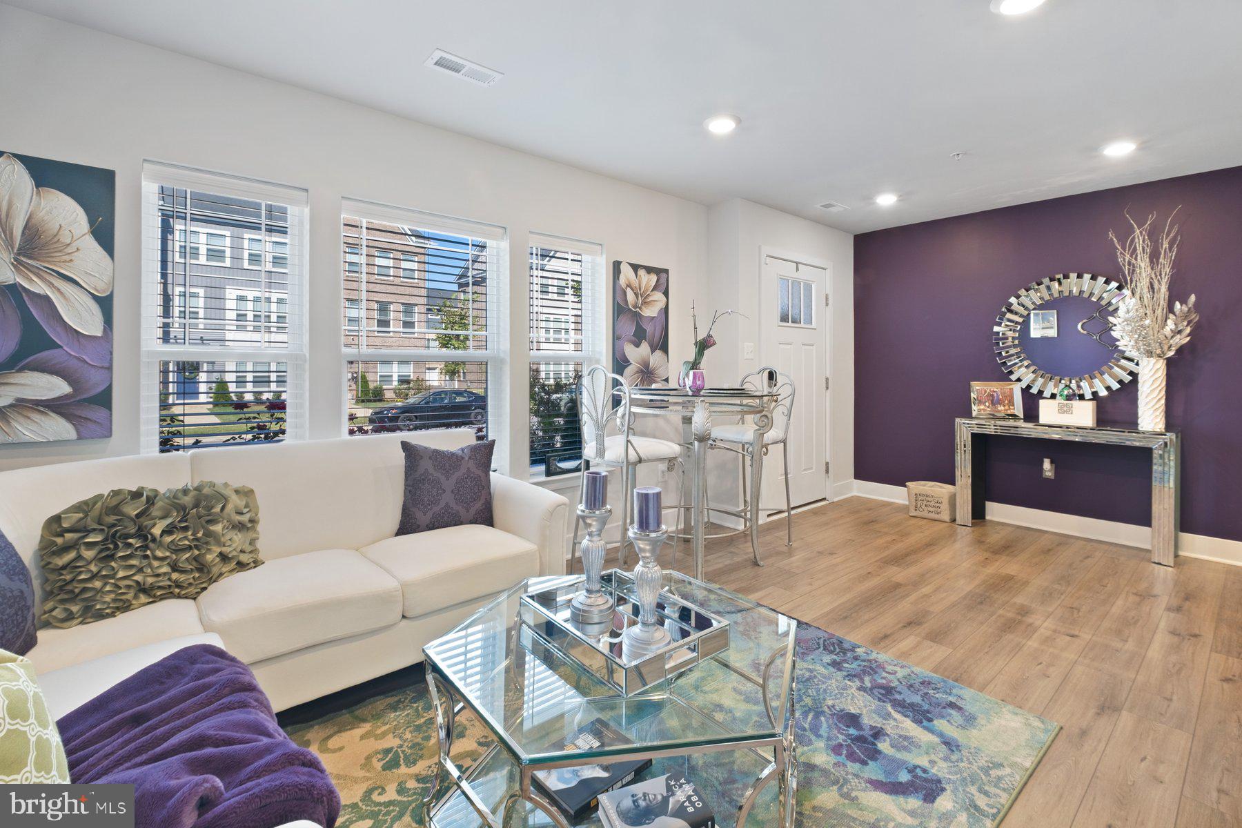 6960 Farragut Drive Bryans Road, MD 20616 - Photo 4 of 25 a living room with furniture and a large window