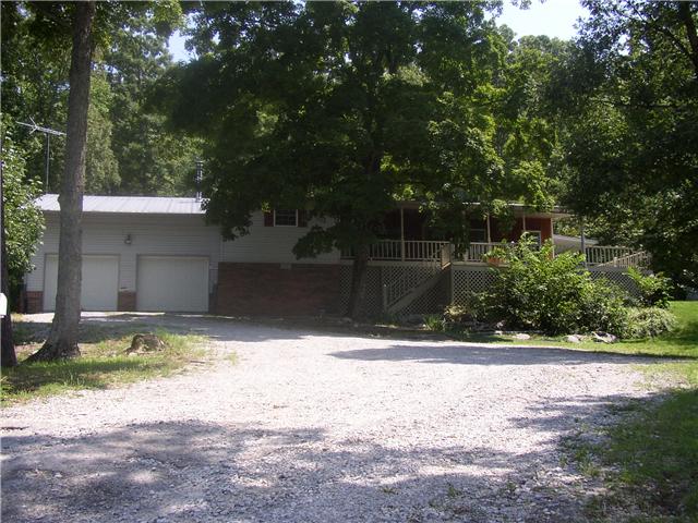 66 Young Mountain Road Pelham, TN 37366 - Photo 1 of 20 a view of a backyard