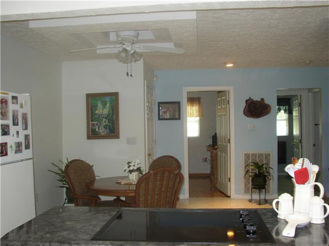 66 Young Mountain Road Pelham, TN 37366 - Photo 12 of 20 a dining room with furniture and window