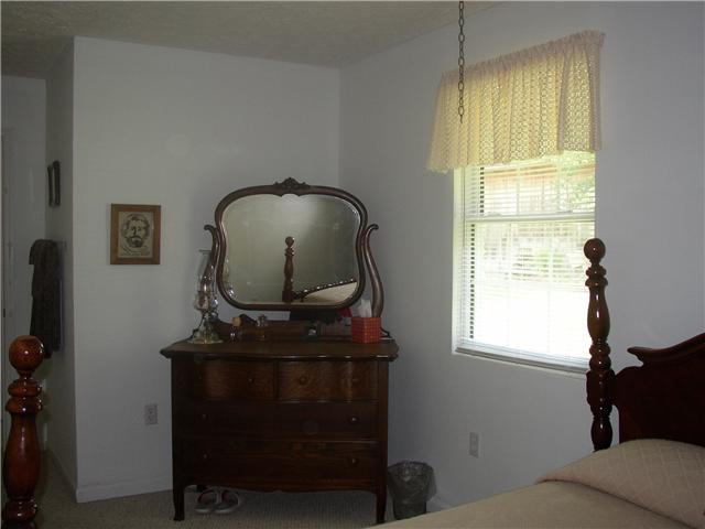 66 Young Mountain Road Pelham, TN 37366 - Photo 15 of 20 a room with a window