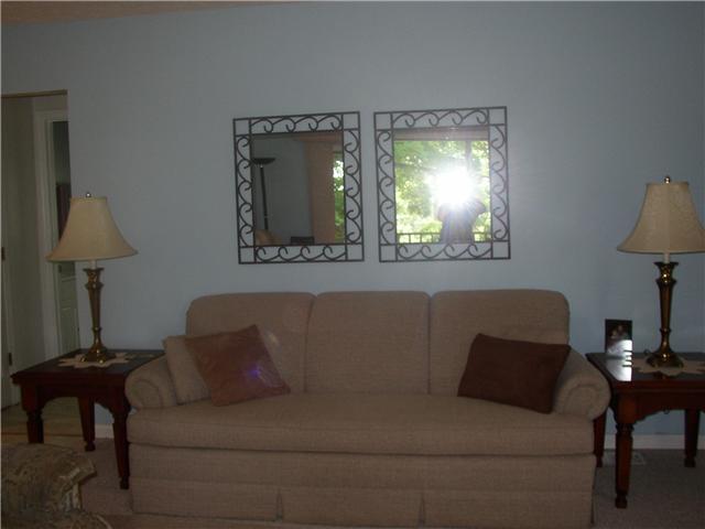 66 Young Mountain Road Pelham, TN 37366 - Photo 9 of 20 a living room with a couch and a window
