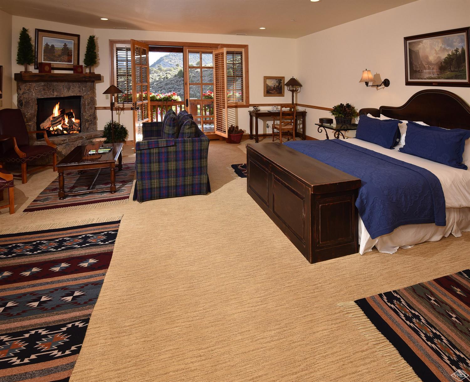 1550 Diamond Star Road Wolcott, CO 81655 - Photo 21 of 25 a living room with furniture and a fireplace