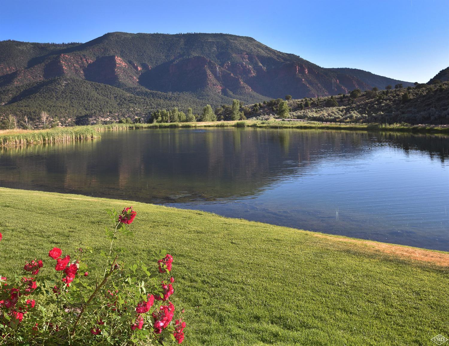 1550 Diamond Star Road Wolcott, CO 81655 - Photo 6 of 25 a view of a lake with a mountain in the background