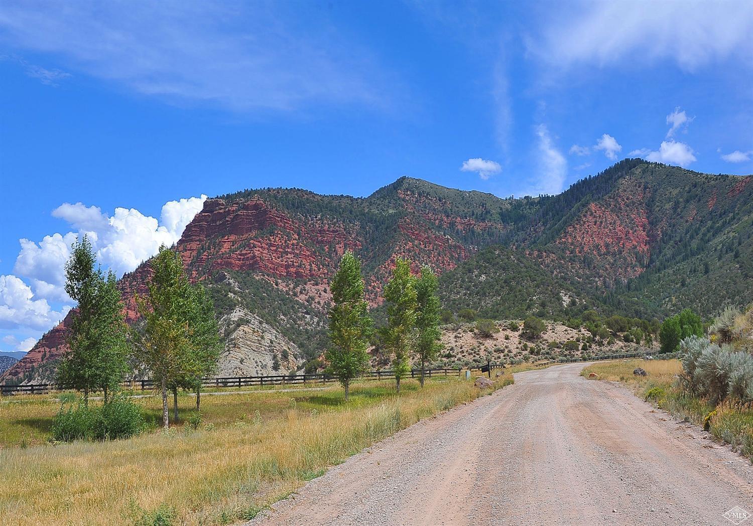 1550 Diamond Star Road Wolcott, CO 81655 - Photo 8 of 25 a view of a lake with a mountain in the background