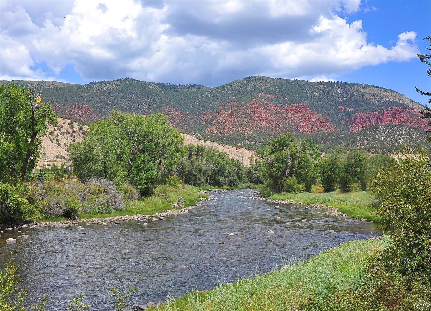 1550 Diamond Star Road Wolcott, CO 81655 - Photo 9 of 25 a view of a mountain with sunset in the background