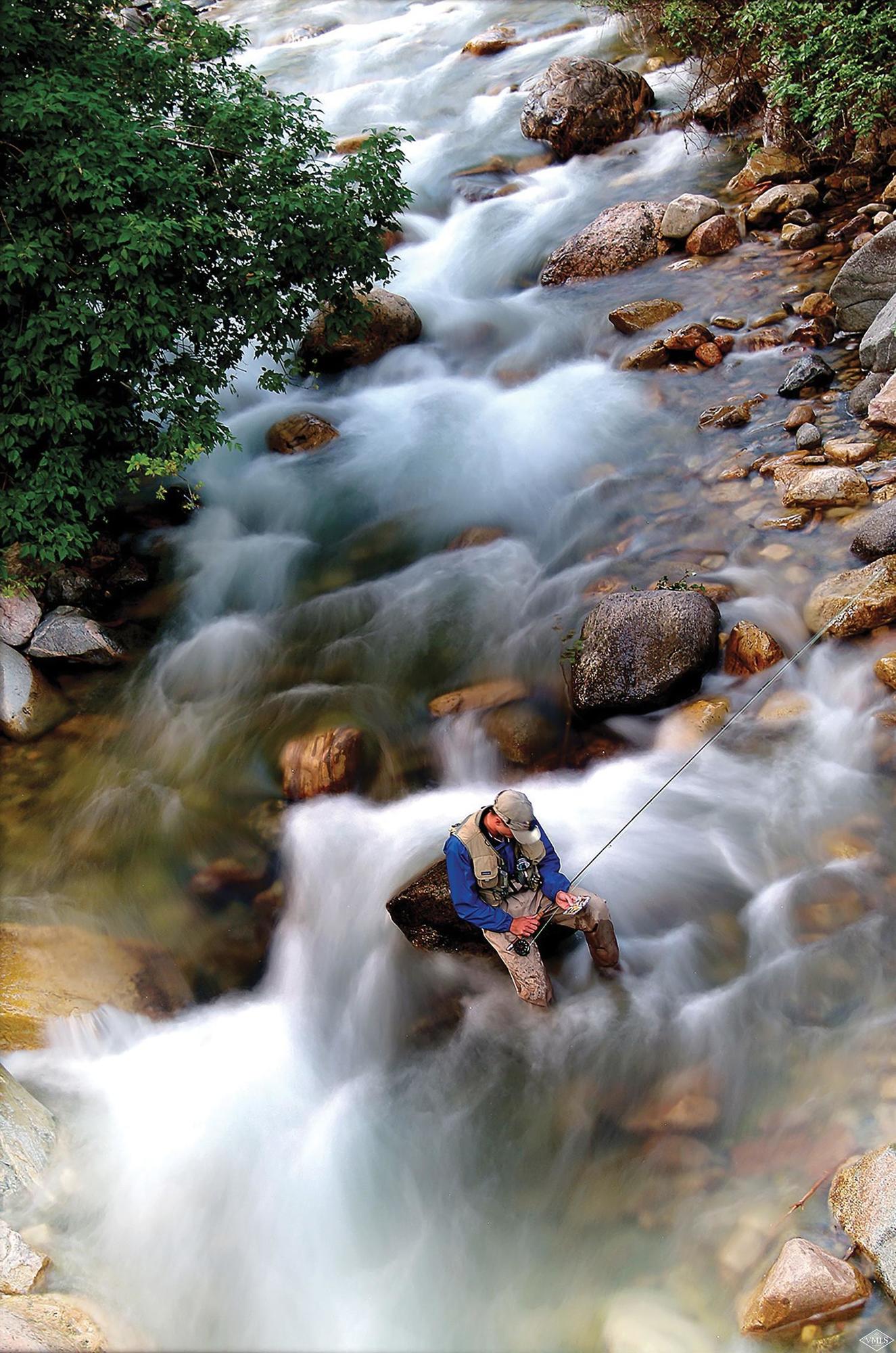 1550 Diamond Star Road Wolcott, CO 81655 - Photo 10 of 25 a view of a backyard of the house