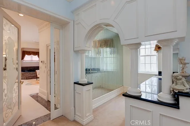 a large white room with furniture