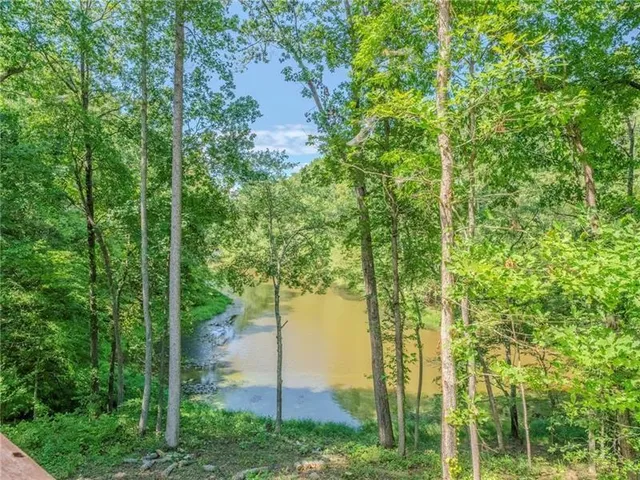 a view of a door and chair in the back yard