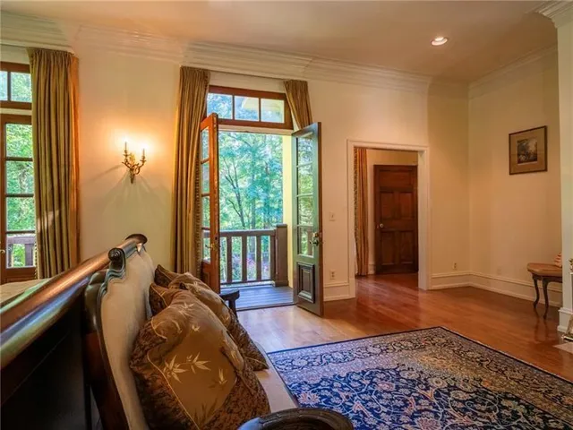 an aerial view of residential houses with outdoor space and street view