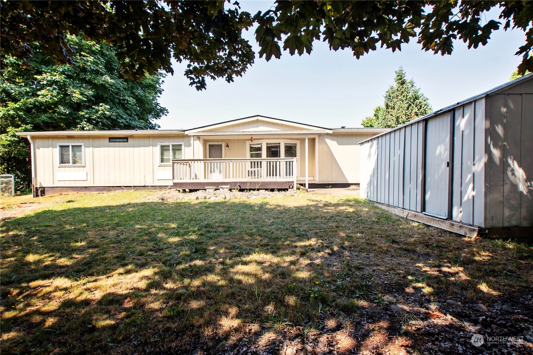 4500 Ruddell Road Southeast, Unit 23 Lacey, WA 98503 - Photo 1 of 24 a front view of a house with garden