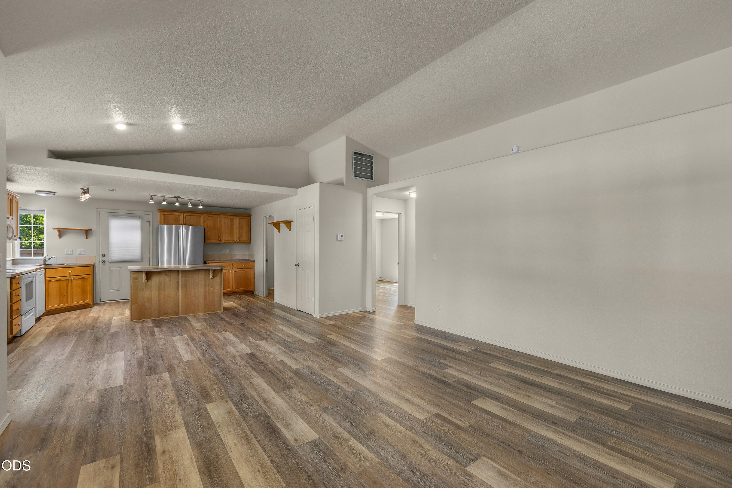 20535 Sunderland Way Bend, OR 97701 - Photo 19 of 41 a view of empty room with wooden floor