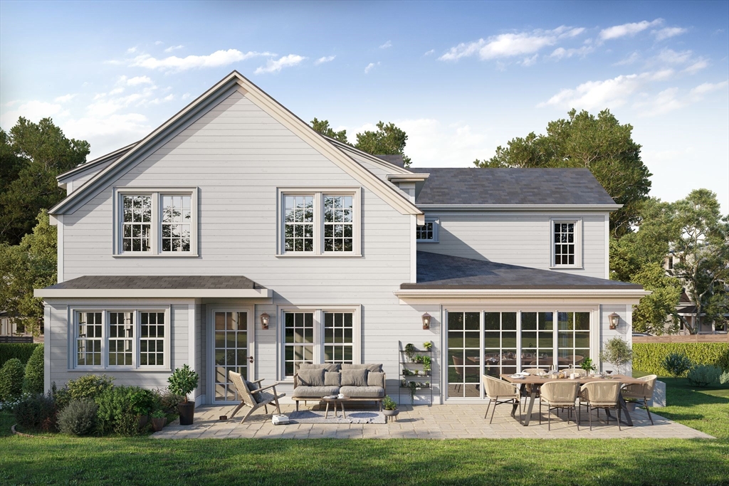 11 Alba Road Wellesley, MA 02481 - Photo 4 of 5 a front view of a house with garden and patio