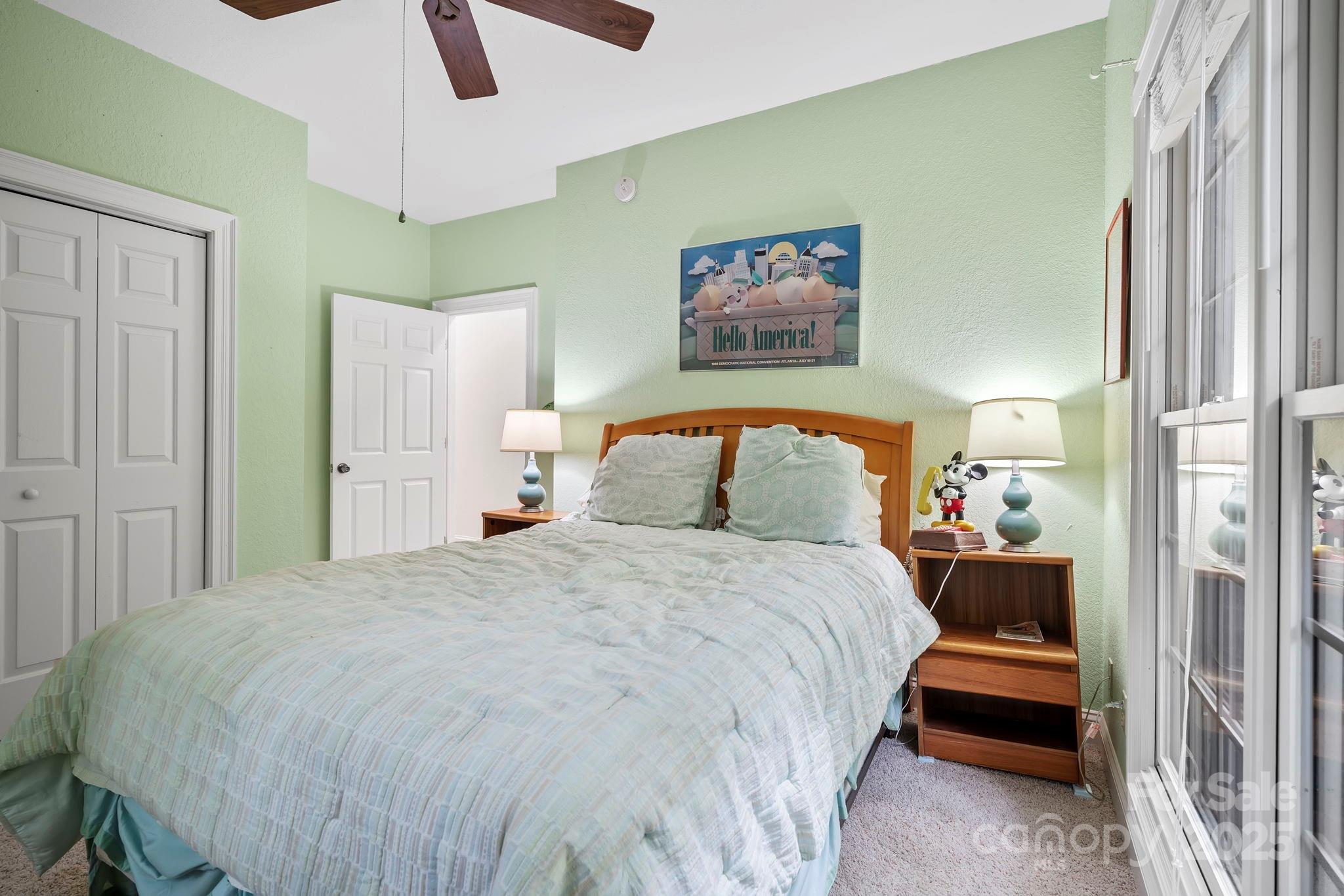 458 Blue Mist Way Arden, NC 28704 - Photo 30 of 47 a bedroom with a bed and a painting on the wall