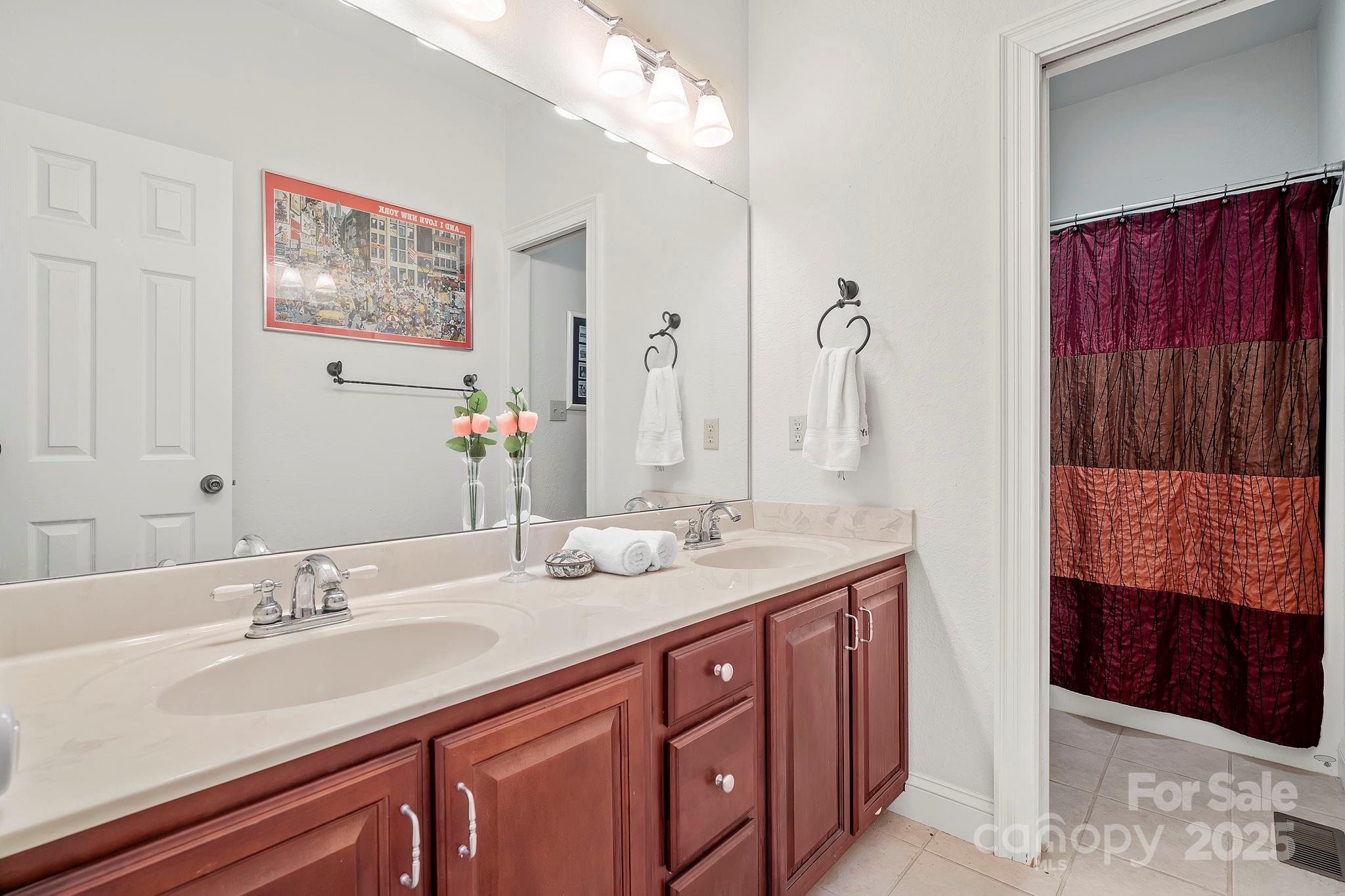 458 Blue Mist Way Arden, NC 28704 - Photo 32 of 47 a bathroom with a sink double vanity and a mirror