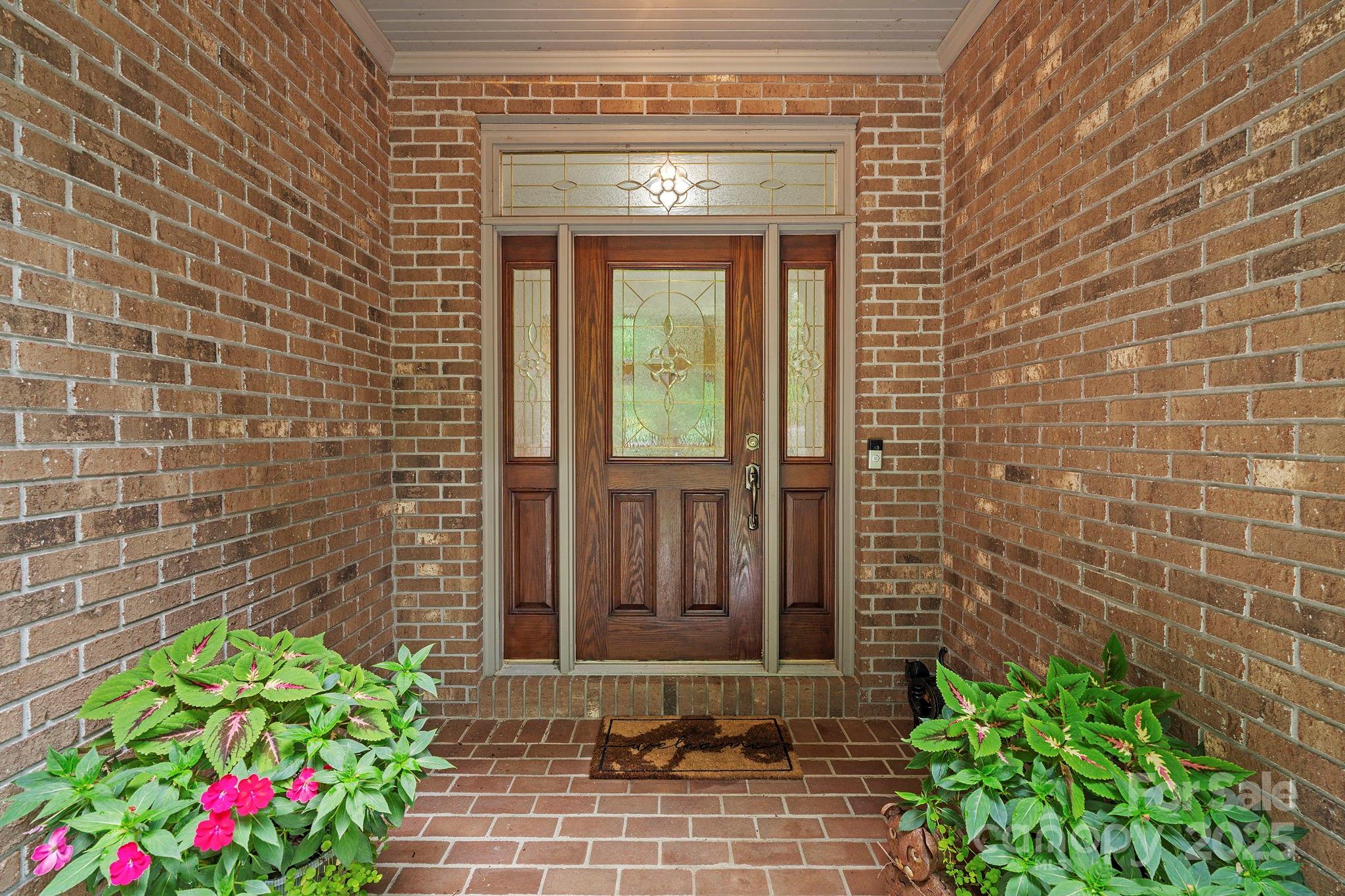 458 Blue Mist Way Arden, NC 28704 - Photo 4 of 47 a front view of a house with a garden