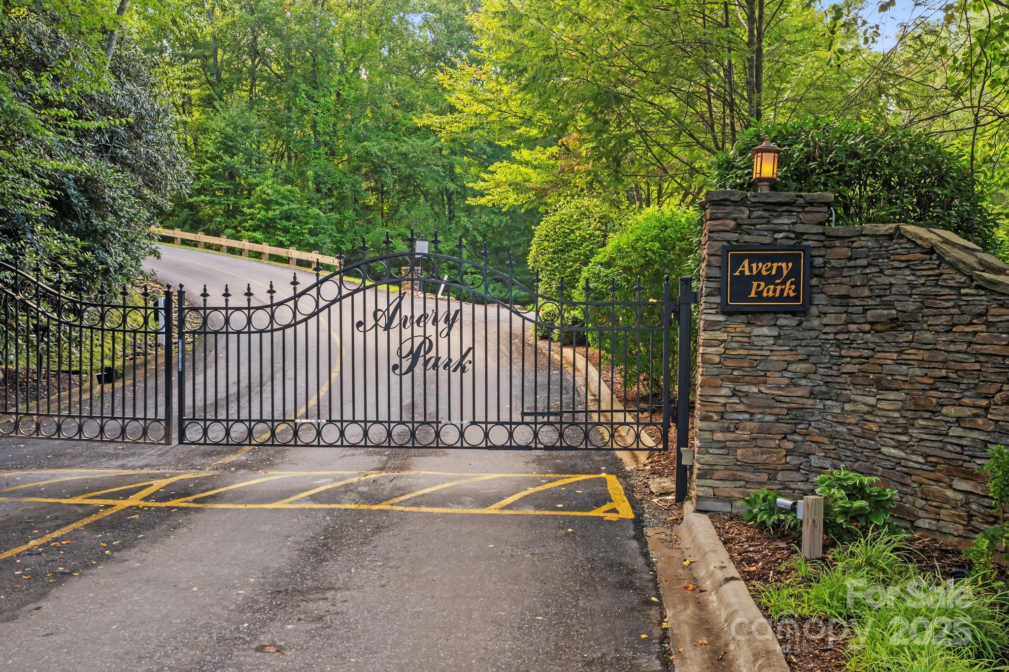 458 Blue Mist Way Arden, NC 28704 - Photo 42 of 47 a view of a brick wall with a small yard